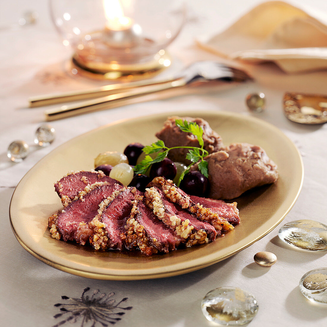 Magrets de canard in walnut crust, grapes and chestnut puree
