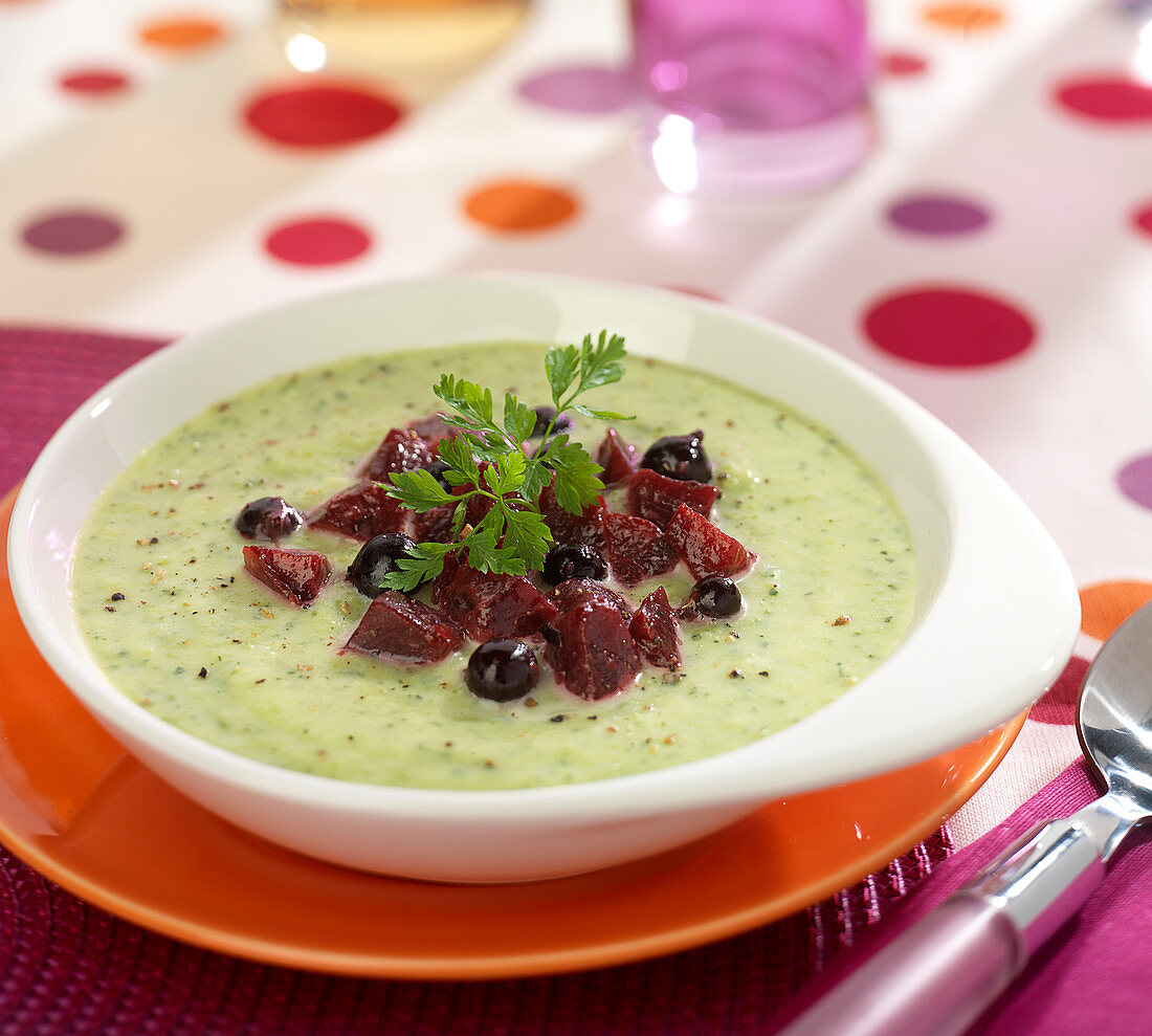 Cream of courgette soup with blackcurrants