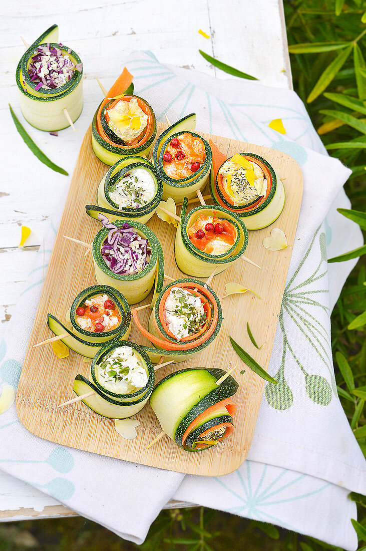 Garnished courgette rolls outdoors