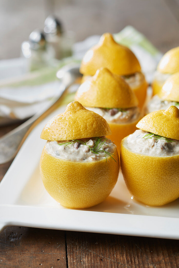 Lemons stuffed with mackerel rillettes in Muscadet