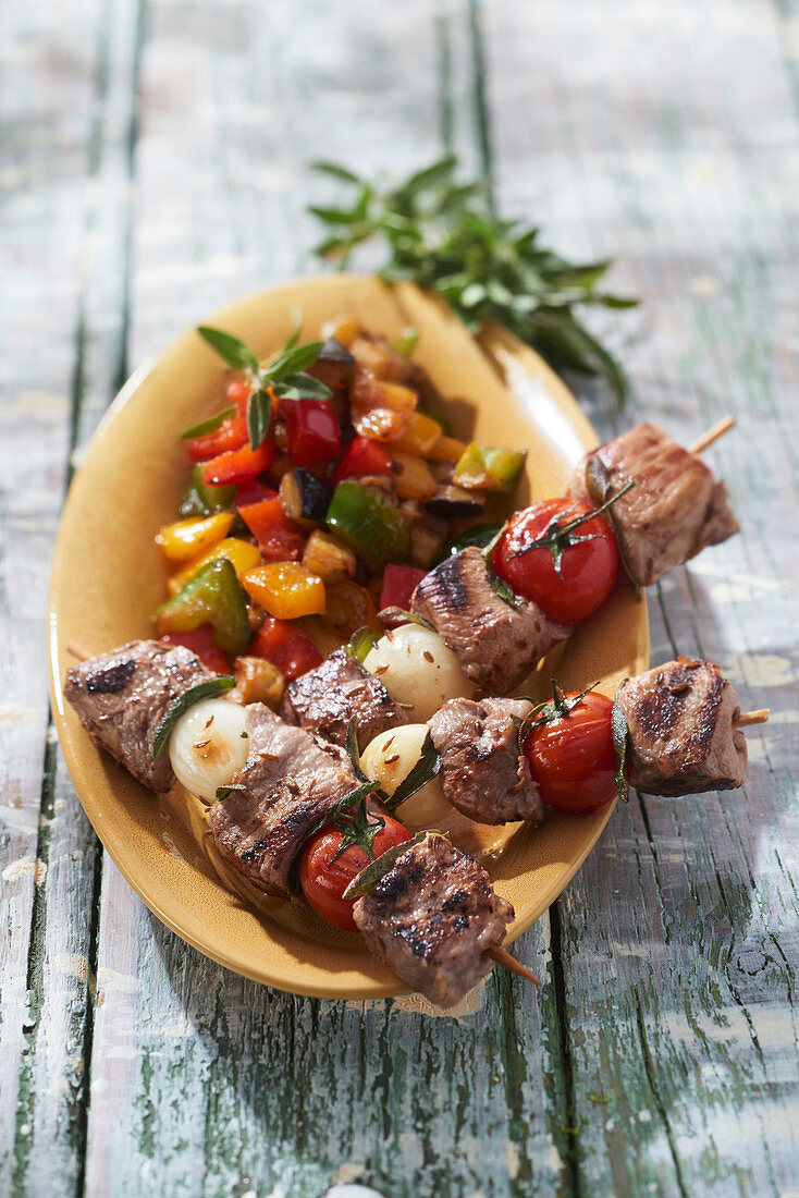 Ostrich skewers with sage, sweet and sour marinade with chouchen and ratatouille