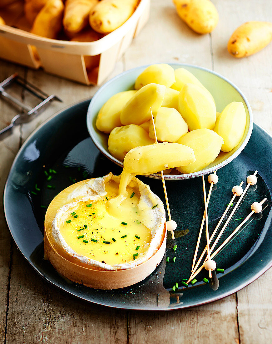 Potatoes with melted Camembert