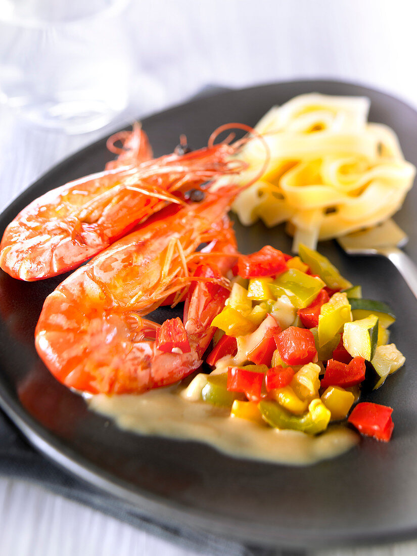 Gambas flambeed with Pastis,Diced vegetables and tagliatelles