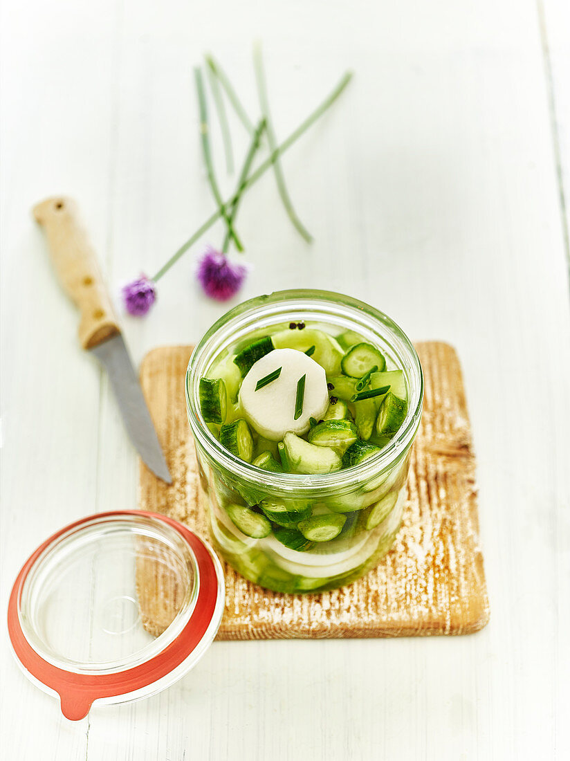 Jar Of Mini Cucumbers,Daikon And Chives For Lacto-Fermentation