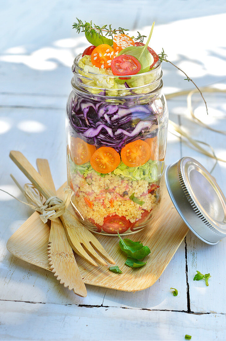 Mixed semolina savoury salad in a jar