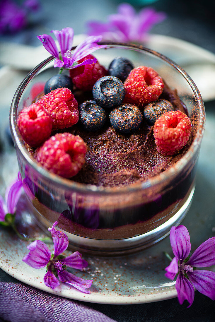 Chocolate mousse with blackcurrant jam, blueberries and raspberries