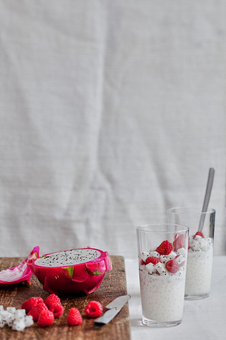 Coconut milk pearl tapioca pudding with pitahaya and raspberries