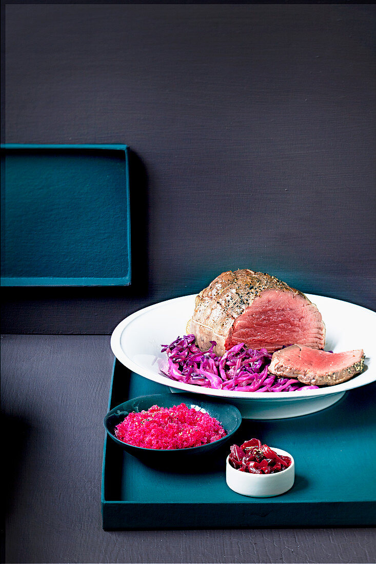 Roast beef with three different red cabbage dishes