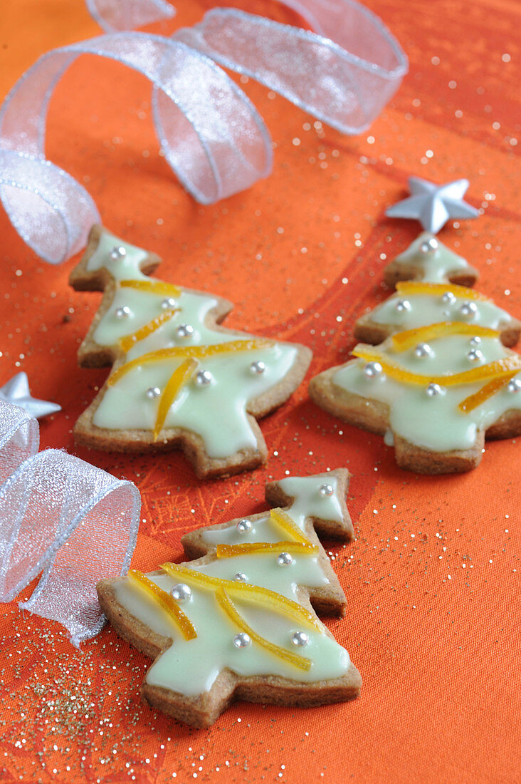 Spicy Shortbread Christmas Trees With Icing And Orange Rinds