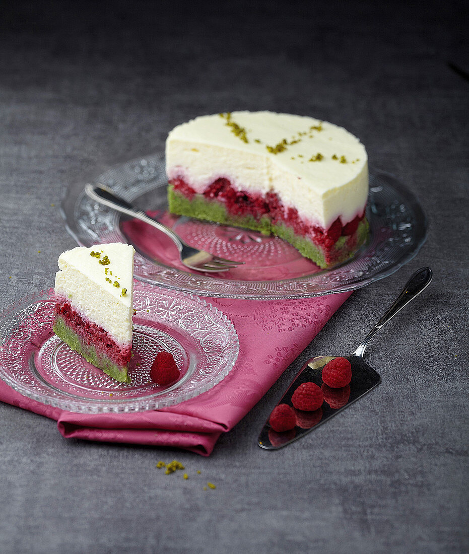 White chocolate,raspberry and pistachio mousse cake