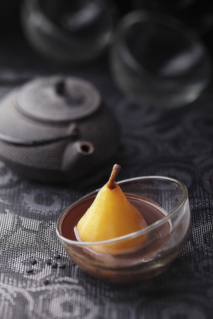 Poached pear with chocolate sauce