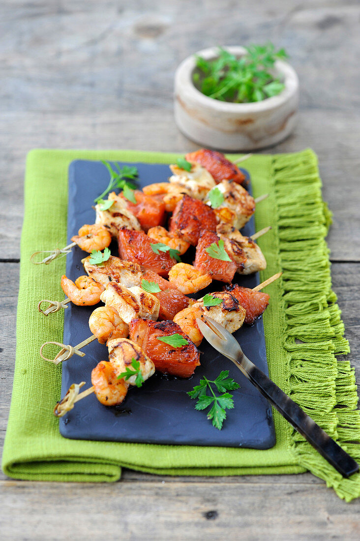 Chicken,crayfish and grapefruit brochettes