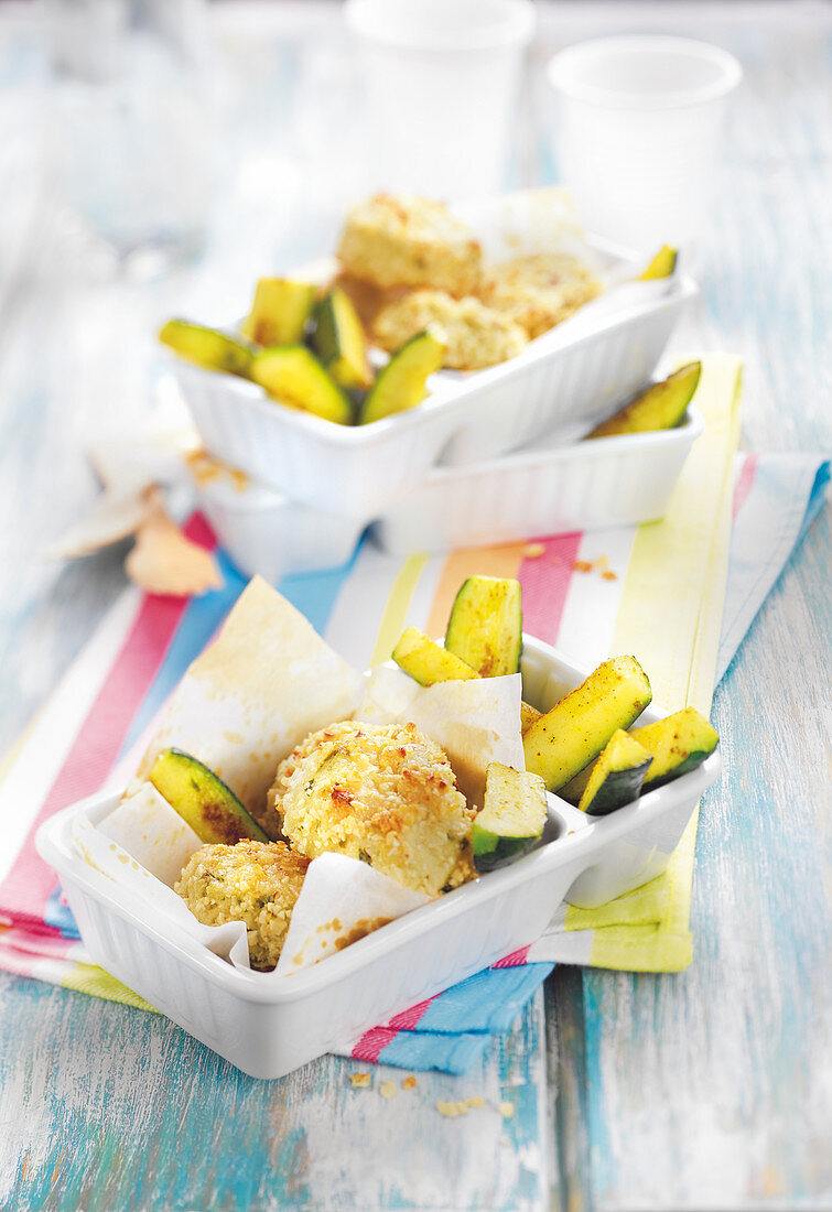 Chicken nuggets and roasted courgettes wedges