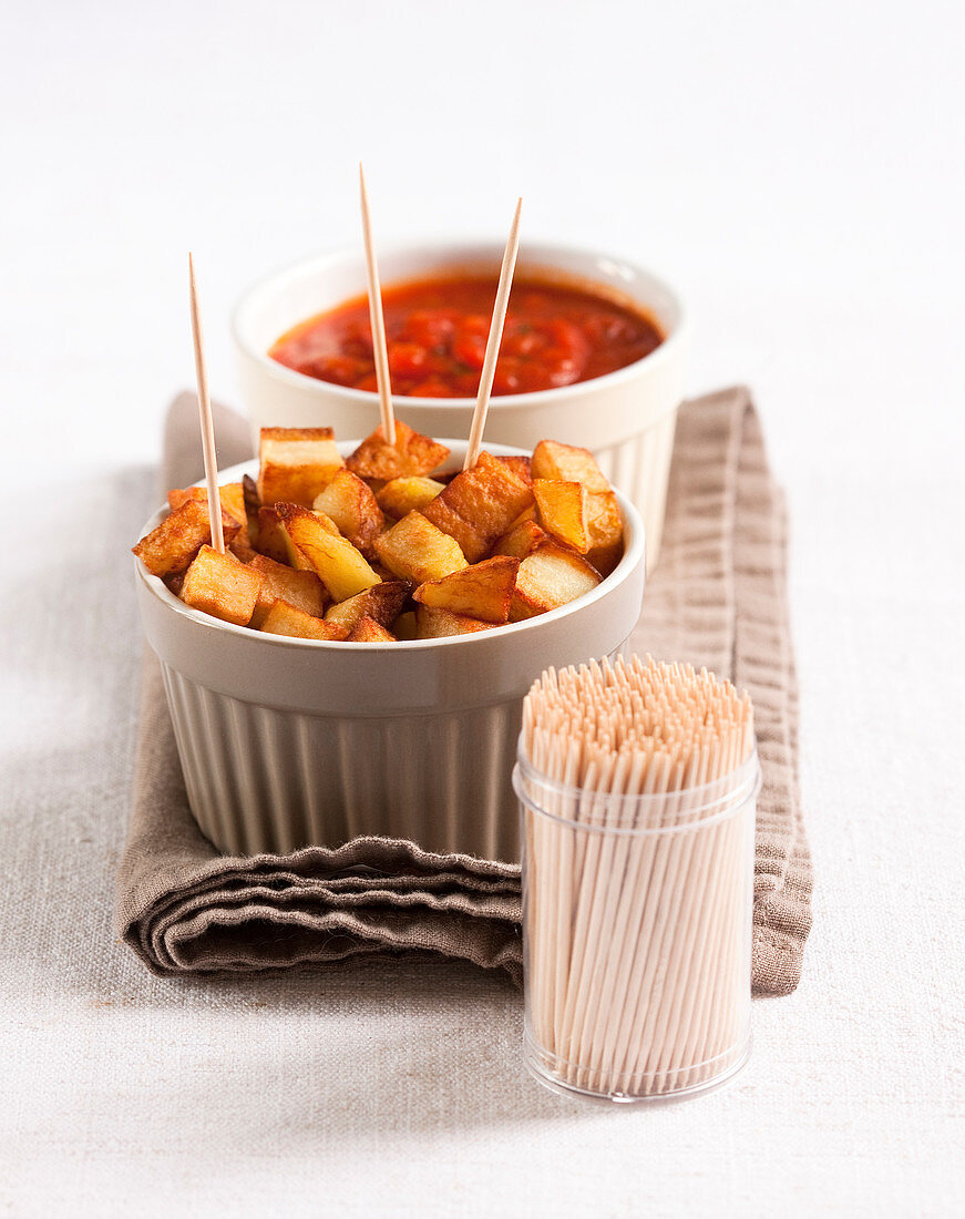 Patatas bravas with red chili pepper sauce