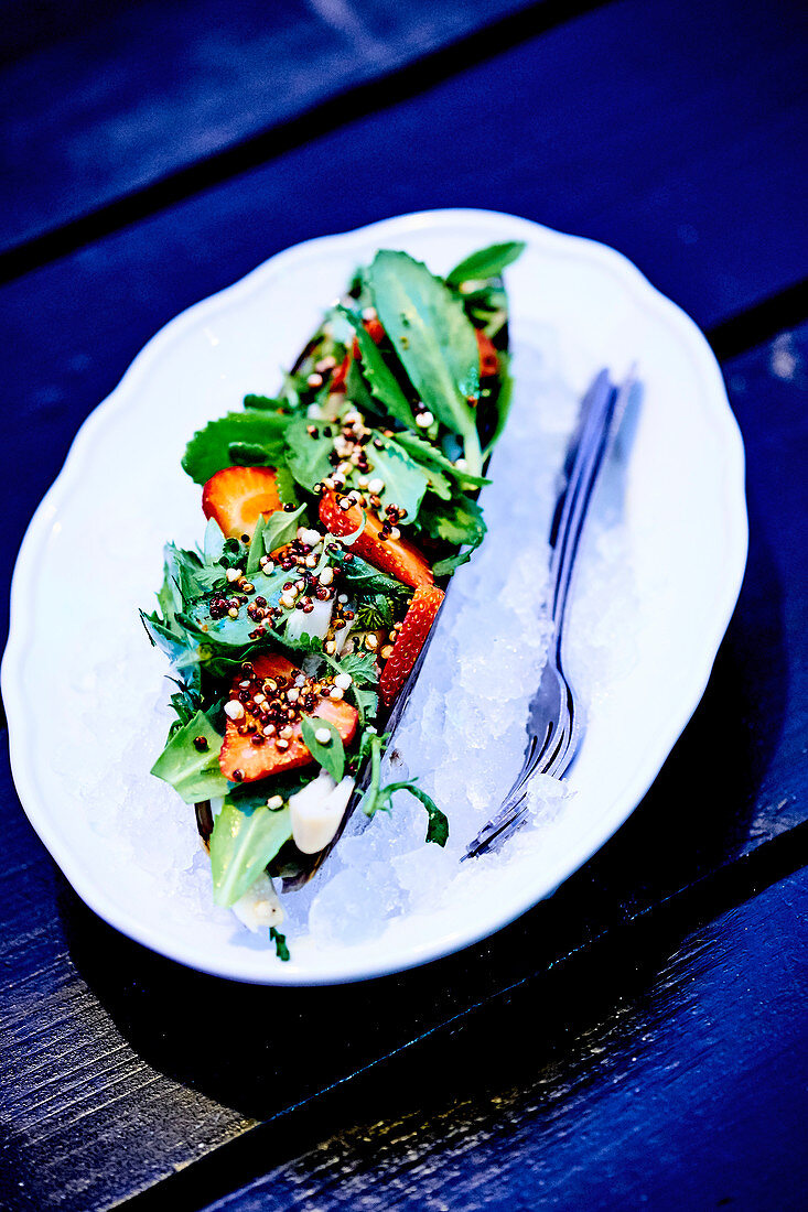 Mixed salad leaves with quinoa,strawberries and razor clams from the Montreal Plaza's restaurant in Montreal