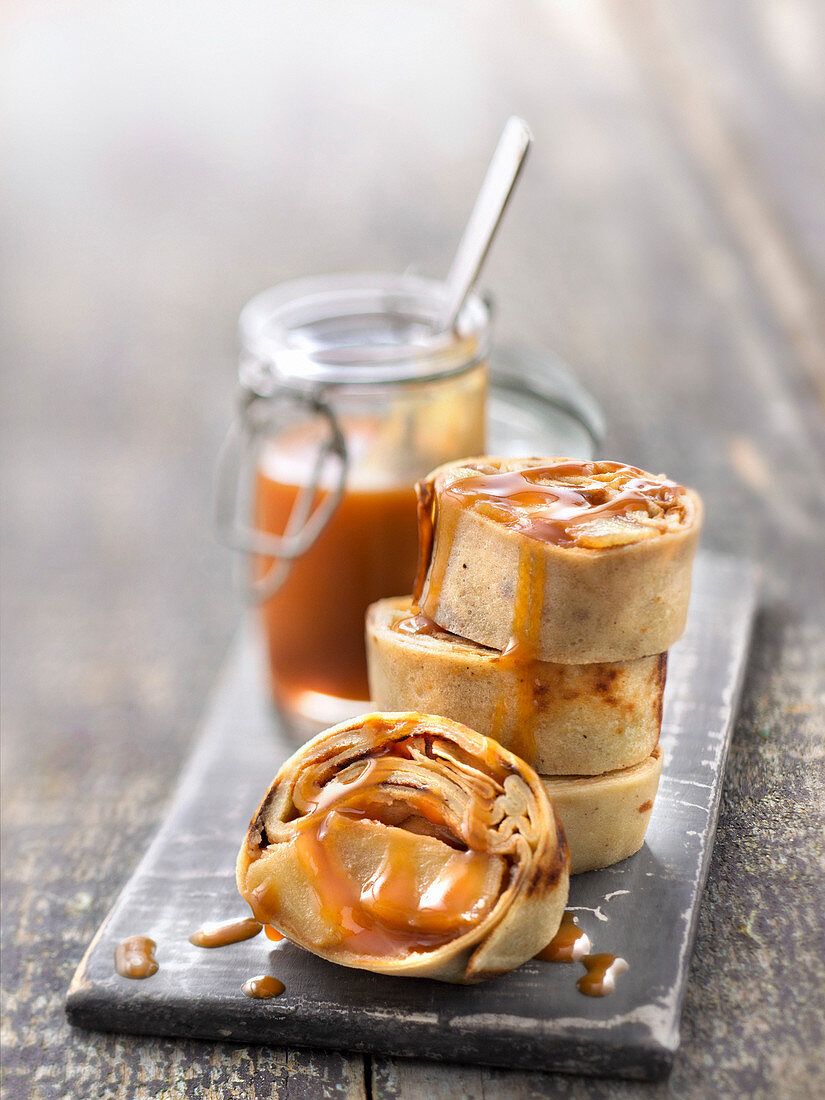 Ballottines of pancakes filled with candied apple and salted butter caramel sauce
