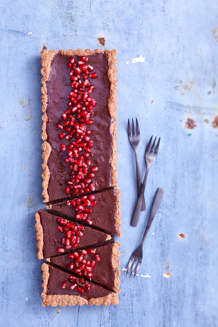 Chocolate and pomegranate chip pie, rectangular cut