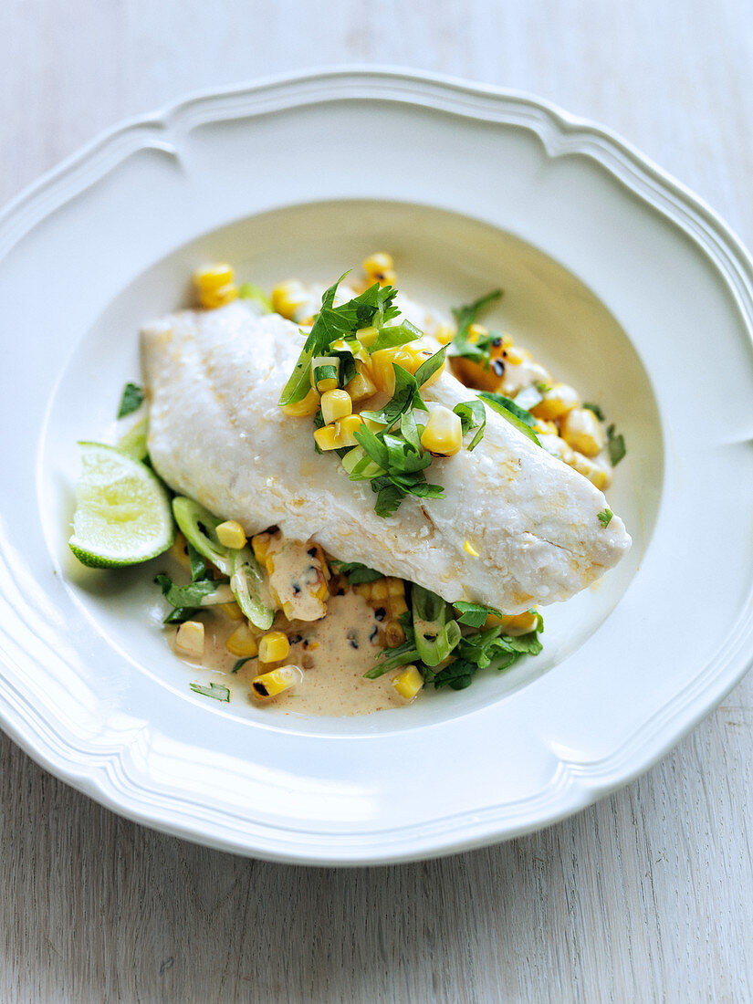 Poached snapper with chorizo oil and grilled corn salad