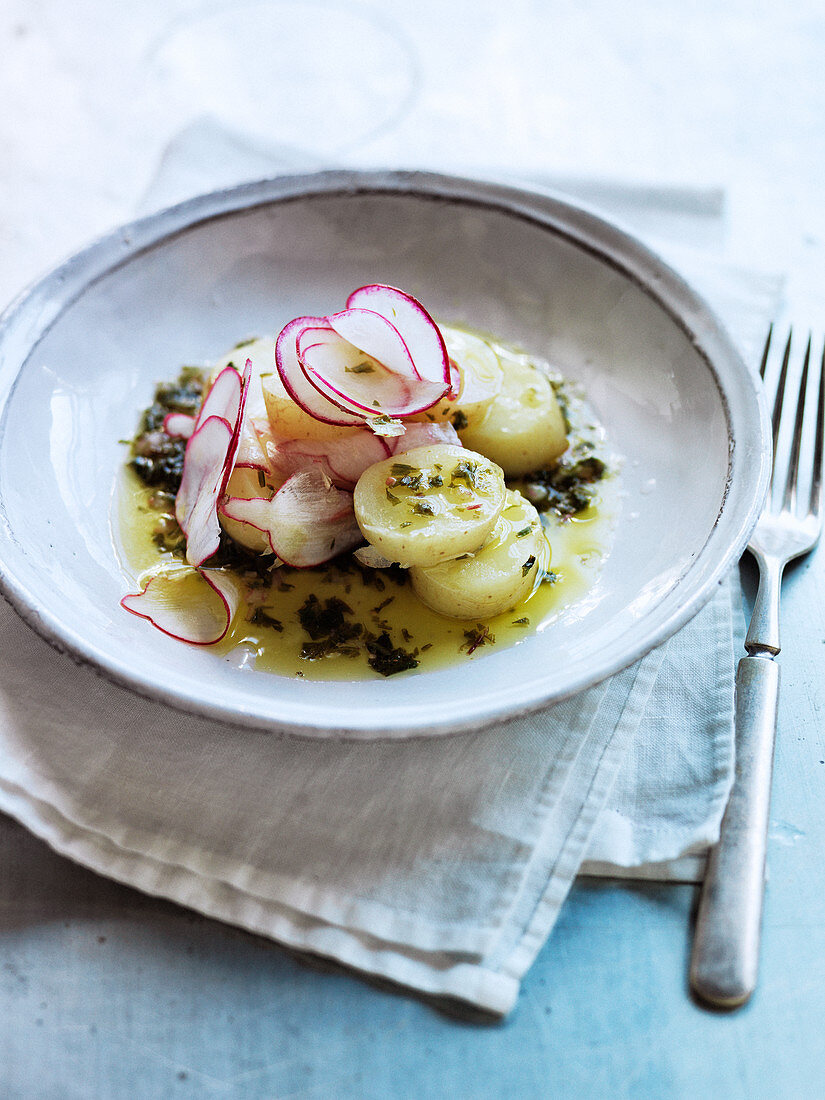 Steamed new potatoes, radish strips and dandelion salsa verde