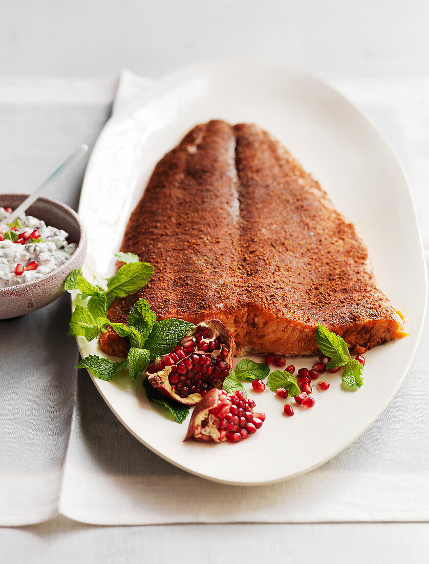Salmon fillet with sweet spices, mint and pomegranate cottage cheese