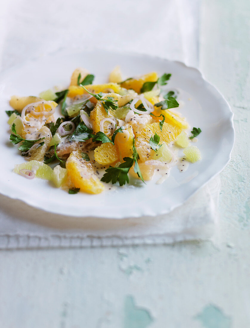 Citrus salad with fresh herbs, shallots and poppy seed
