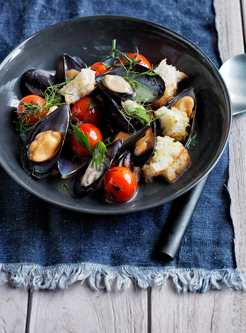 Wood-fired mussels, tomatoes and toasted sourdough bread
