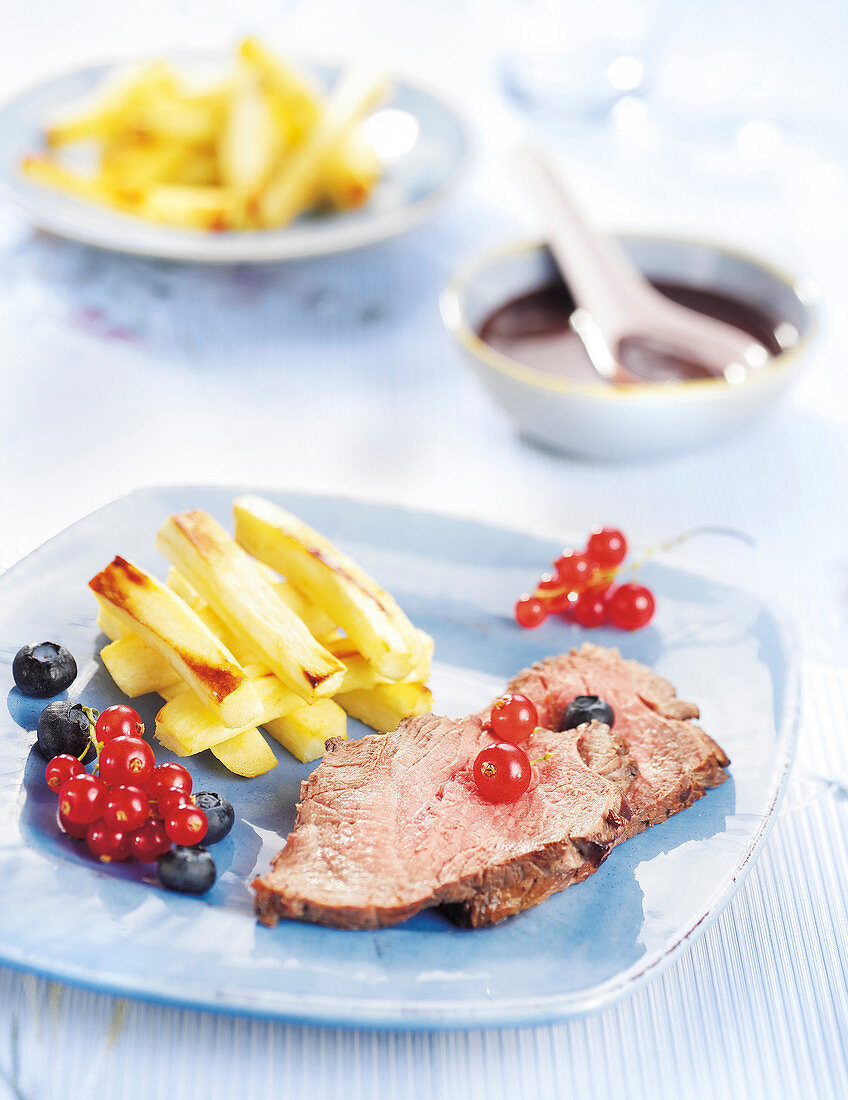 Boar Fillet With Red Berries And Parsnip Chips