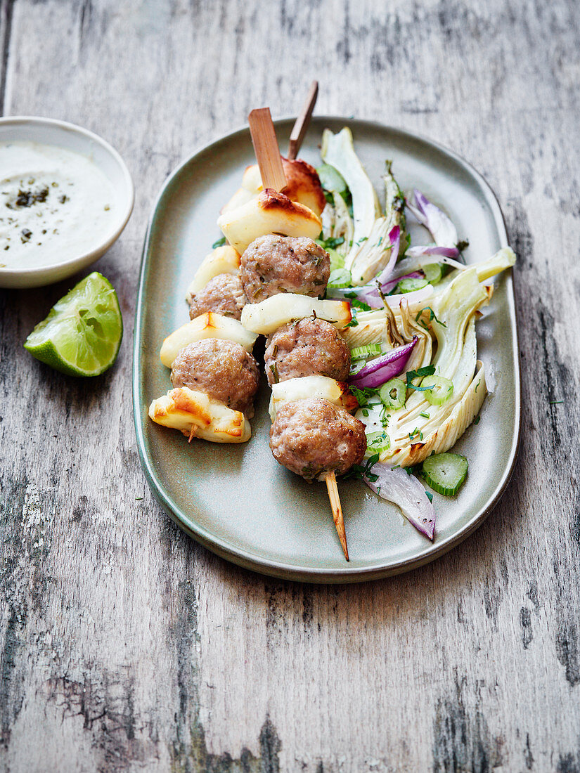 Veal meatball and turnip skewers with fennel salad and red endive