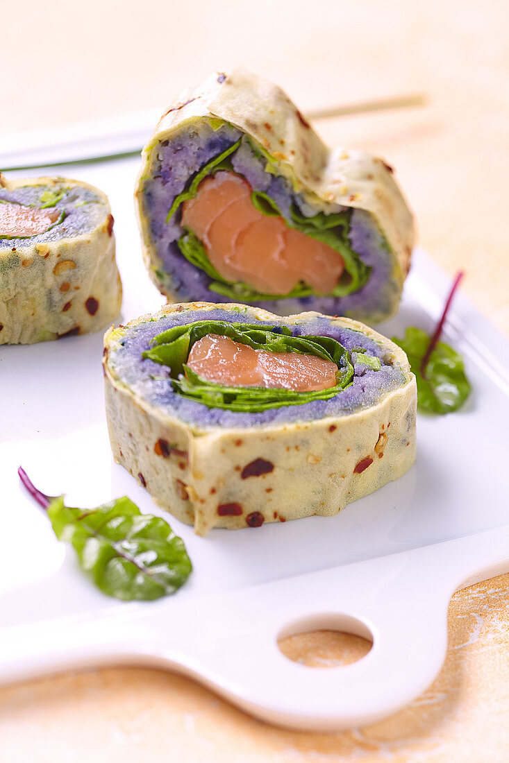 Heart-shaped maki with purple mashed potatoes and salmon