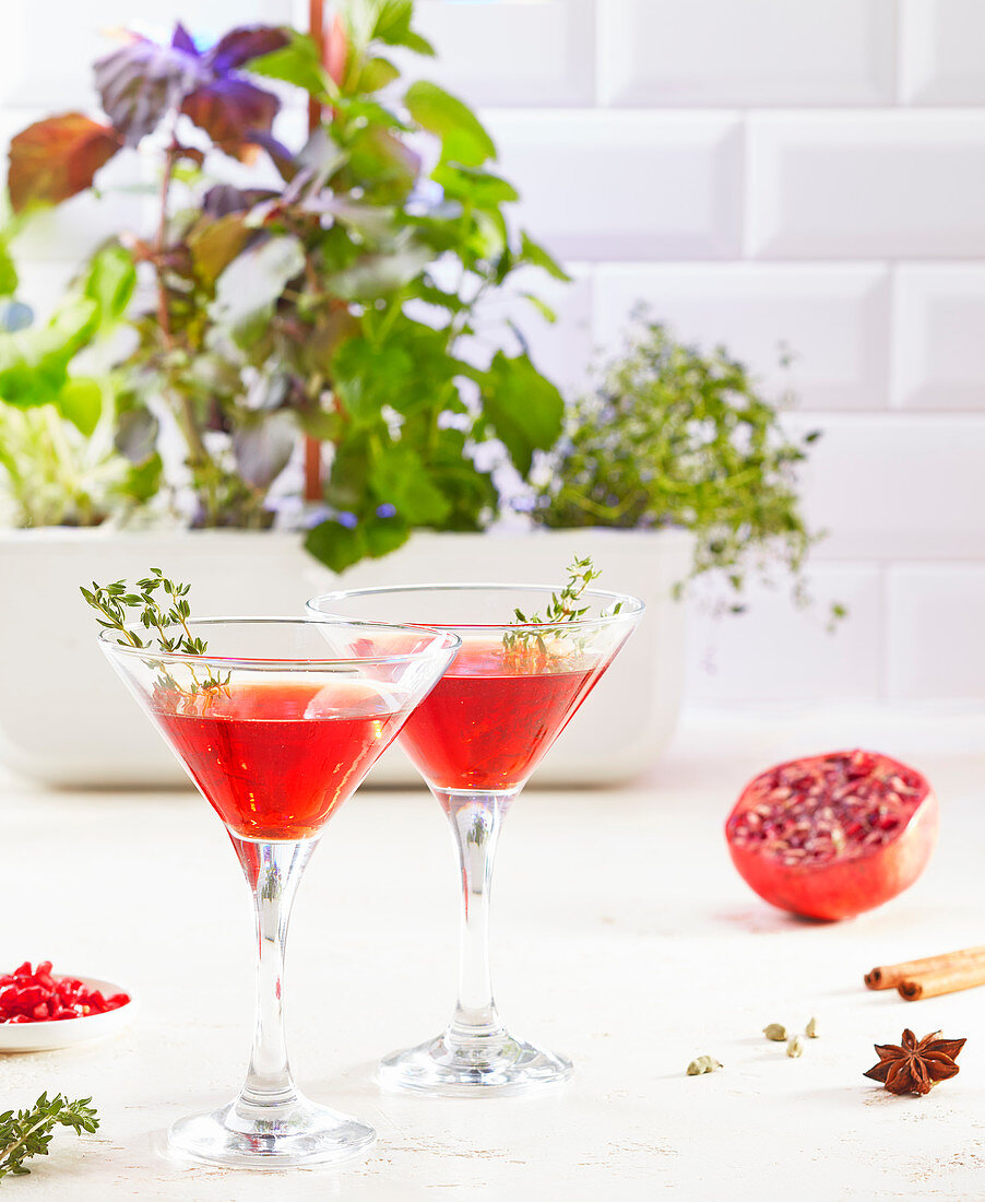Cocktail, pomegranate juice, thyme and cardamom cocktail