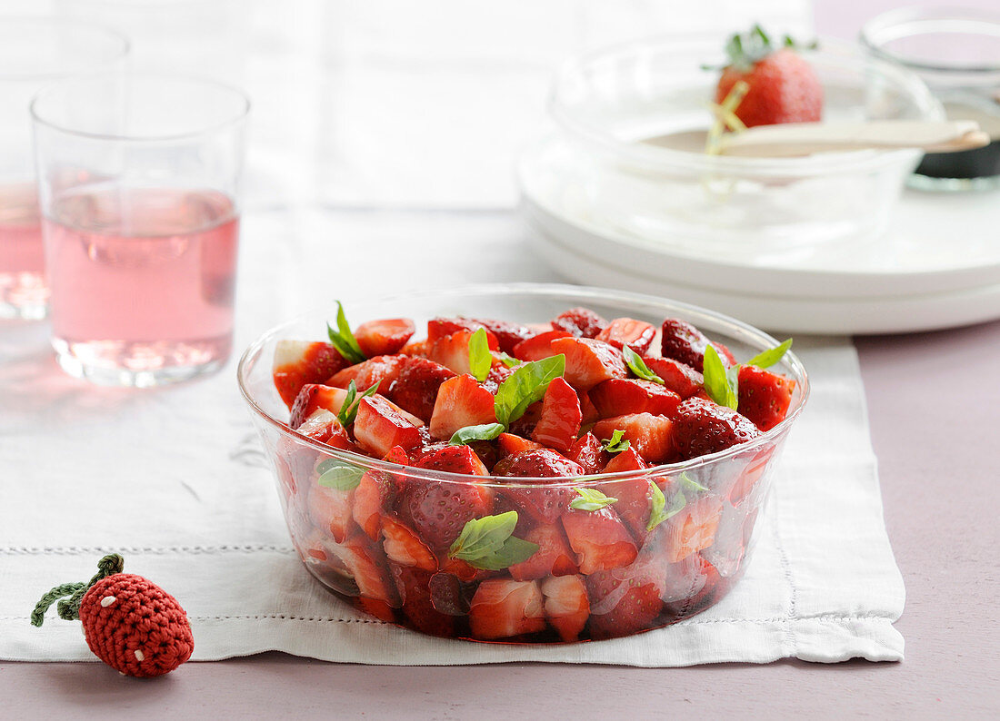 Strawberry fruit salad with fresh basil