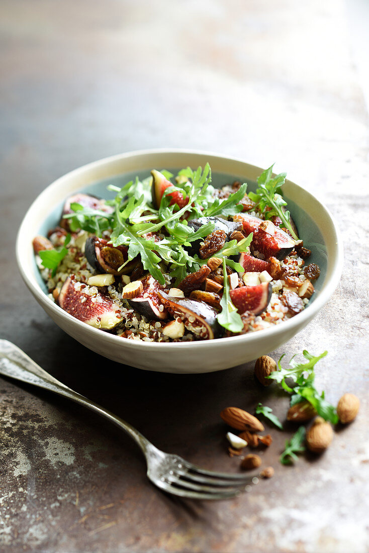 Fig, quinoa, rocket lettuce, almond and raisin salad
