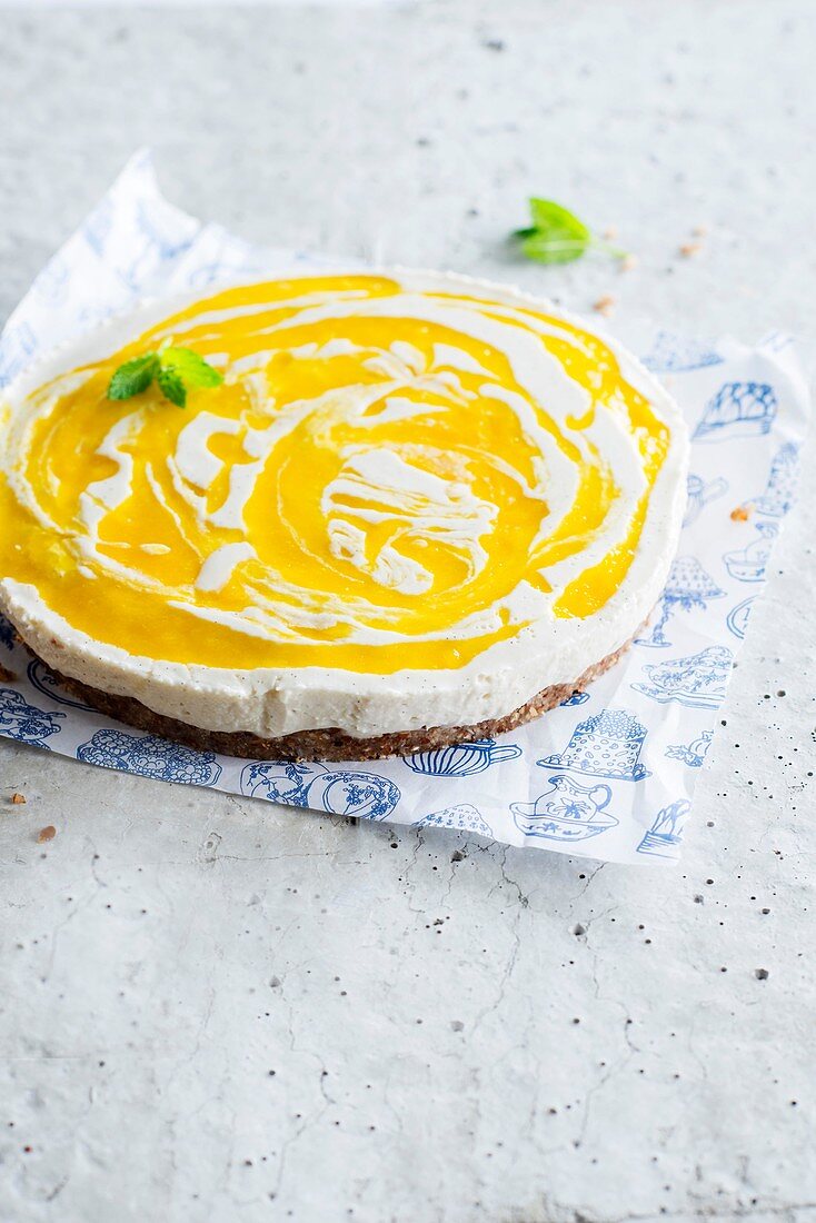 Cheesecake with mango coulis