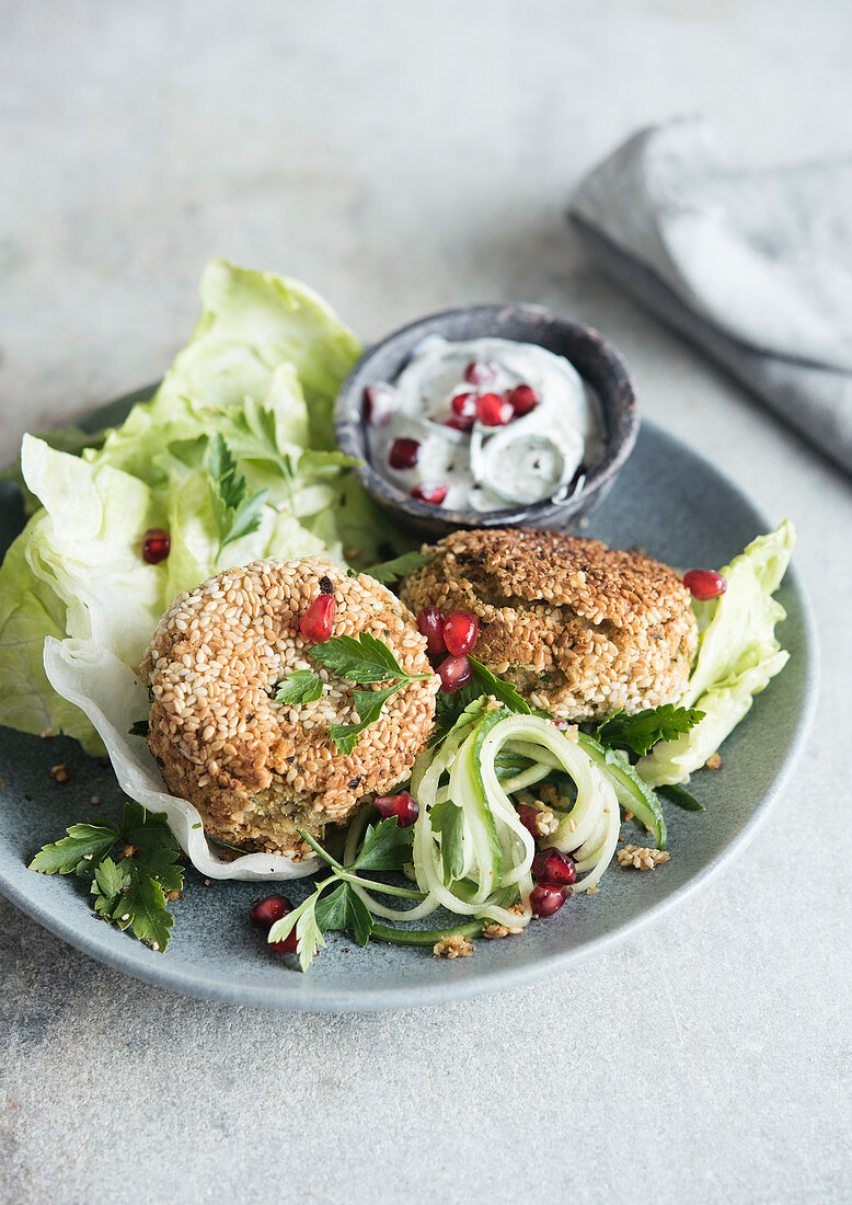 Sesame falafel with iceberg lettuce and tzatziki