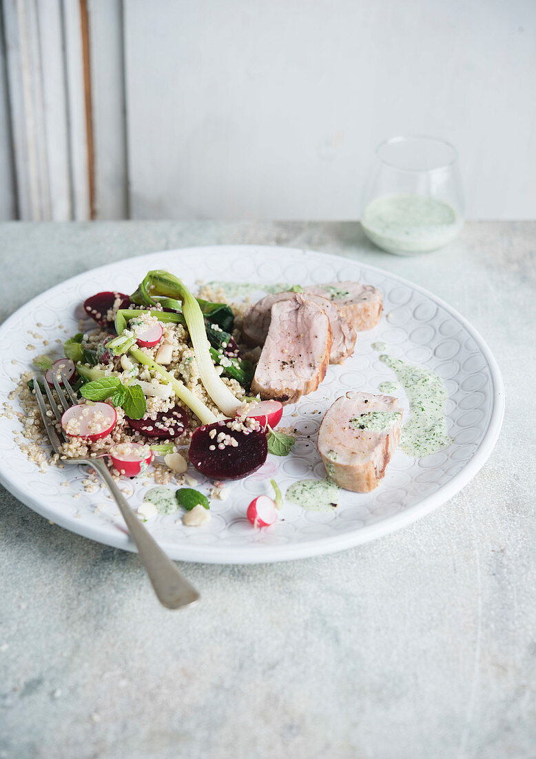 Pork fillet and quinoa salad with spring vegetables