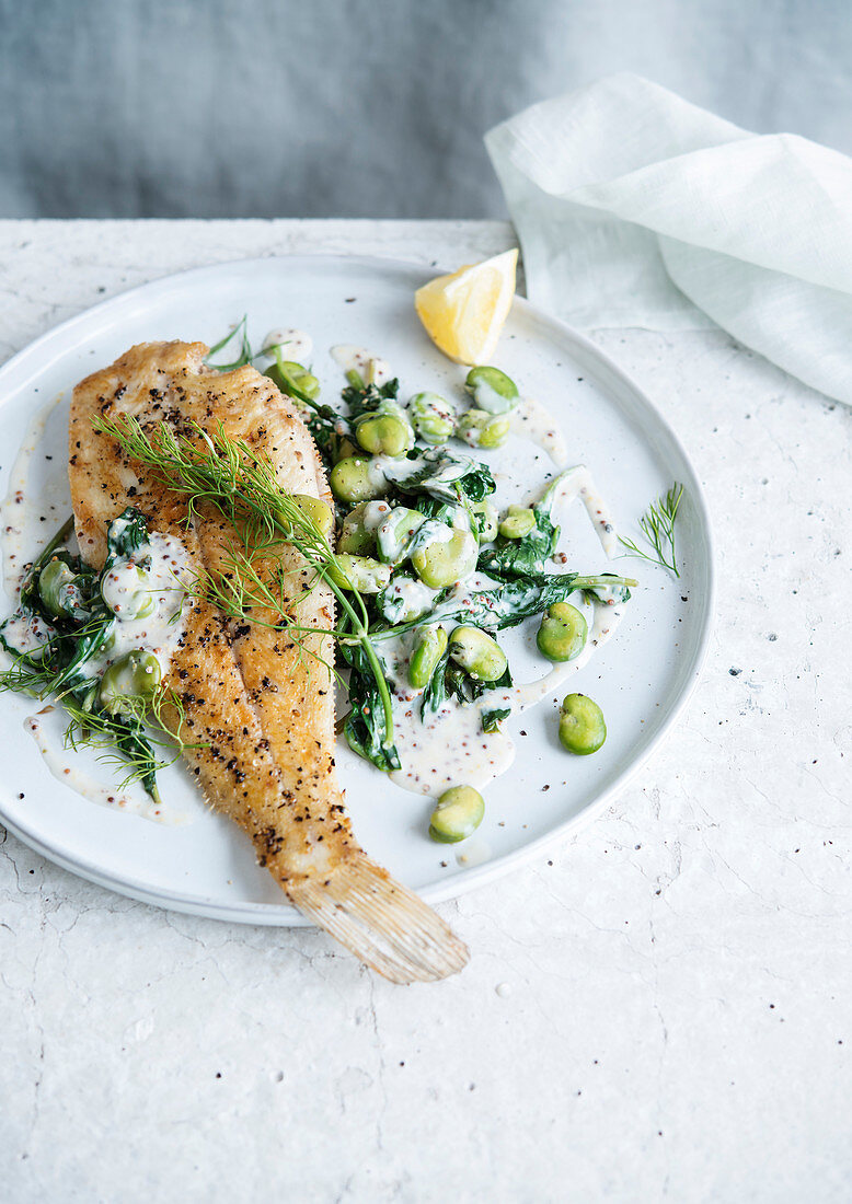 Sole with spinach and broad beans in cream sauce