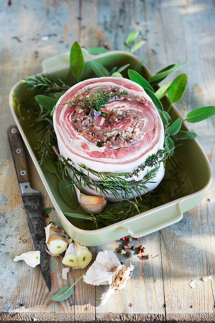 Stuffed raw veal roll with herbs