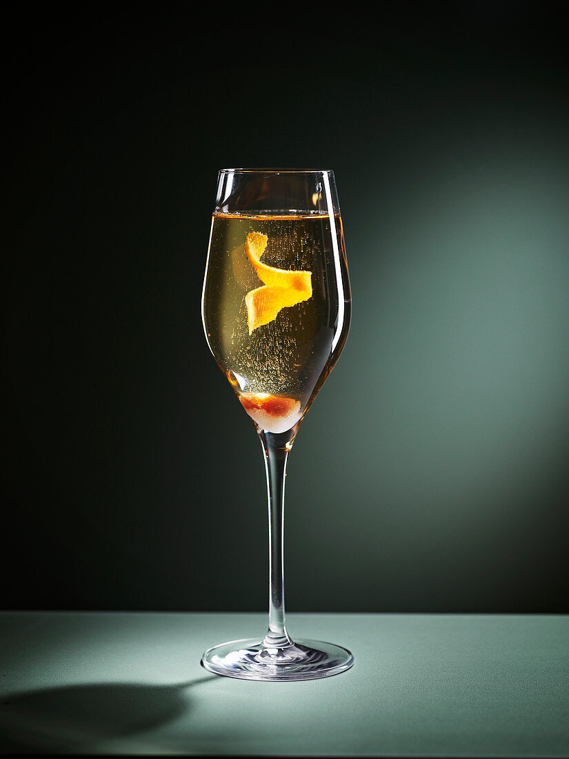 Champagne cocktail with citrus zest