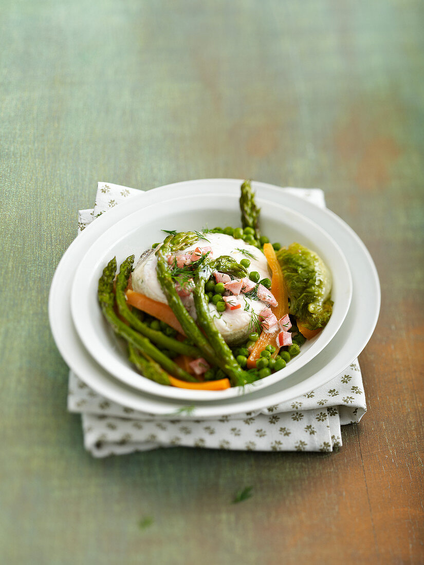 Hake fillet with spring vegetables