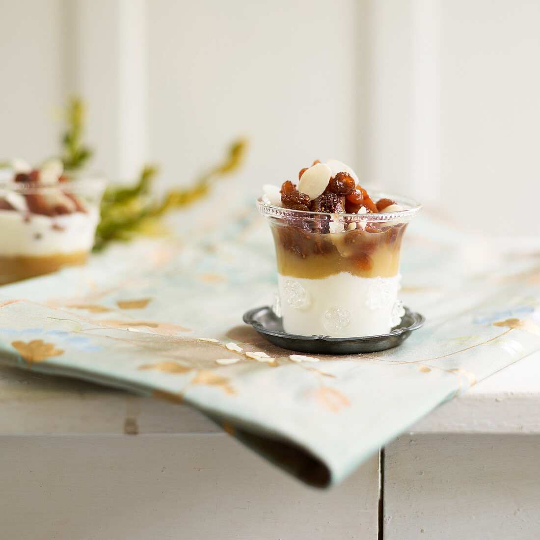 Cream cheese with dried fruit compote, nuts and honey