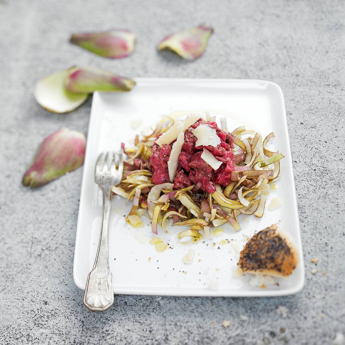 Beef tartare with artichokes and parmesan