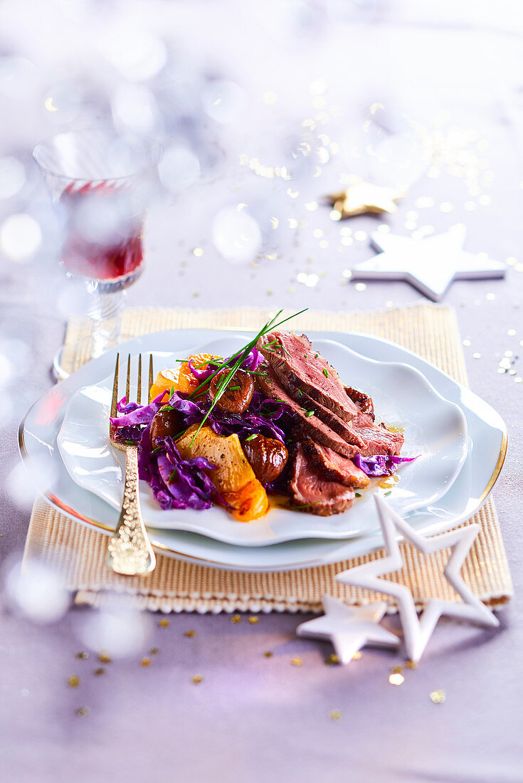 Christmas marinated duck breast with red cabbage and pineapple