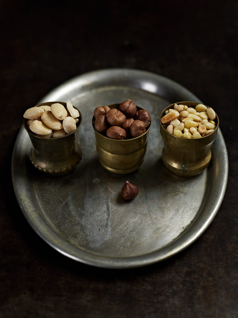 Assorted nuts: Almonds, hazelnuts and pine nuts