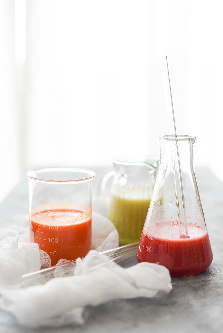 Various fruit juices in test tubes
