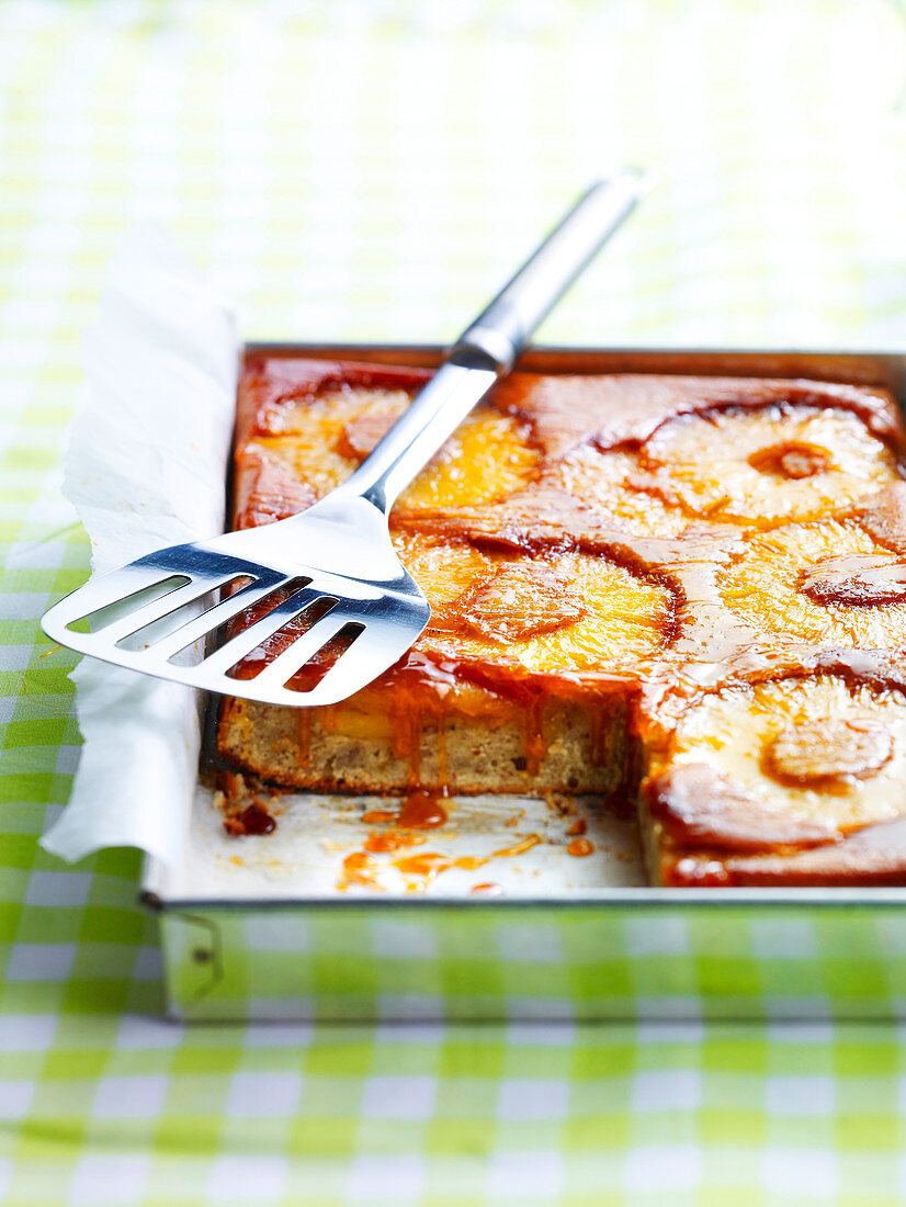 Caramelised pineapple cake in a tray