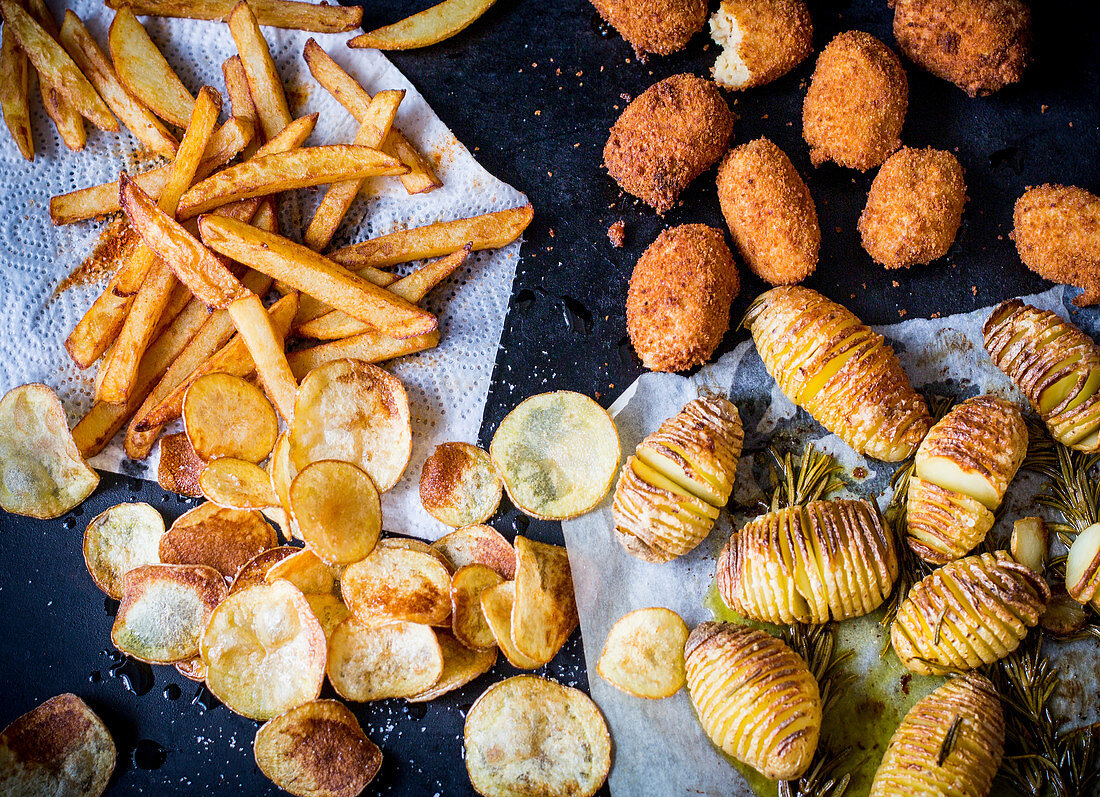 Potatoes four ways: chips, croquettes, crisps and hasselback
