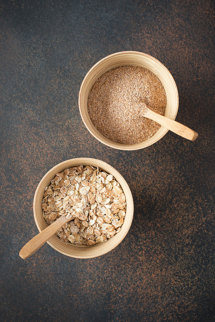 Bran and oatmeal in bowls