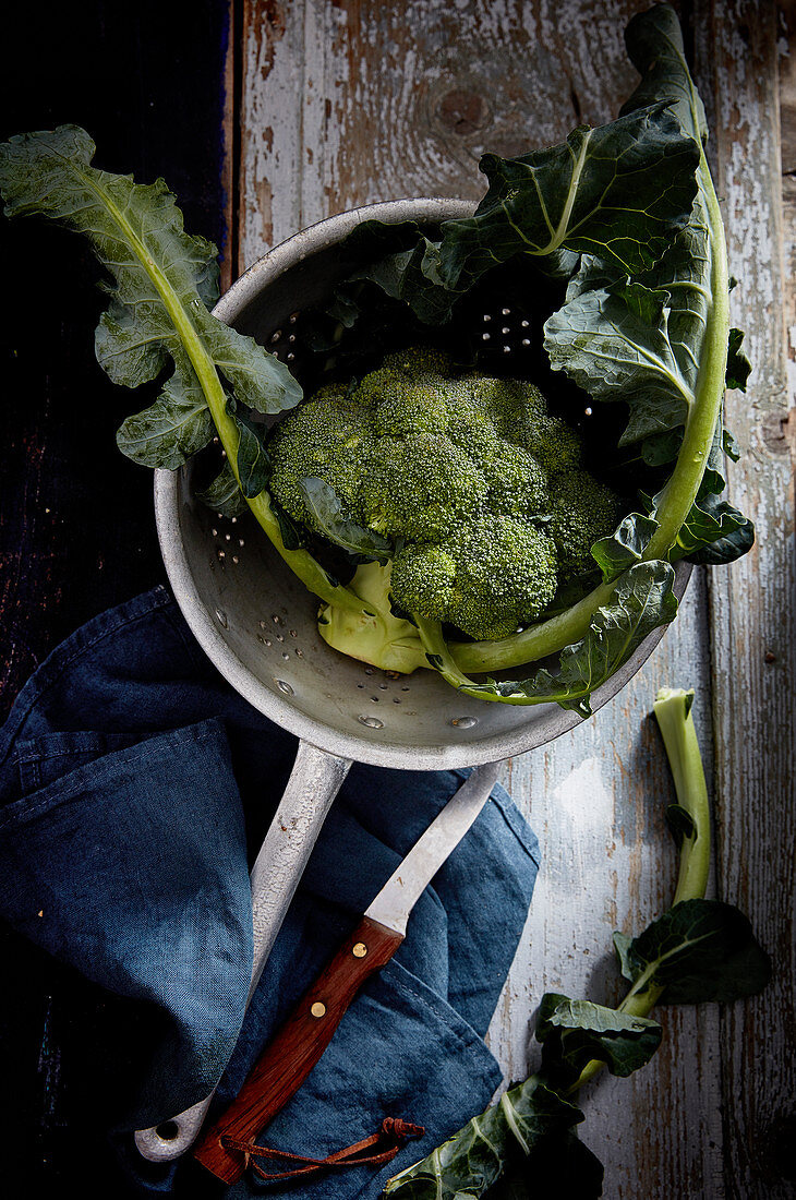 Broccoli in a vintage colander