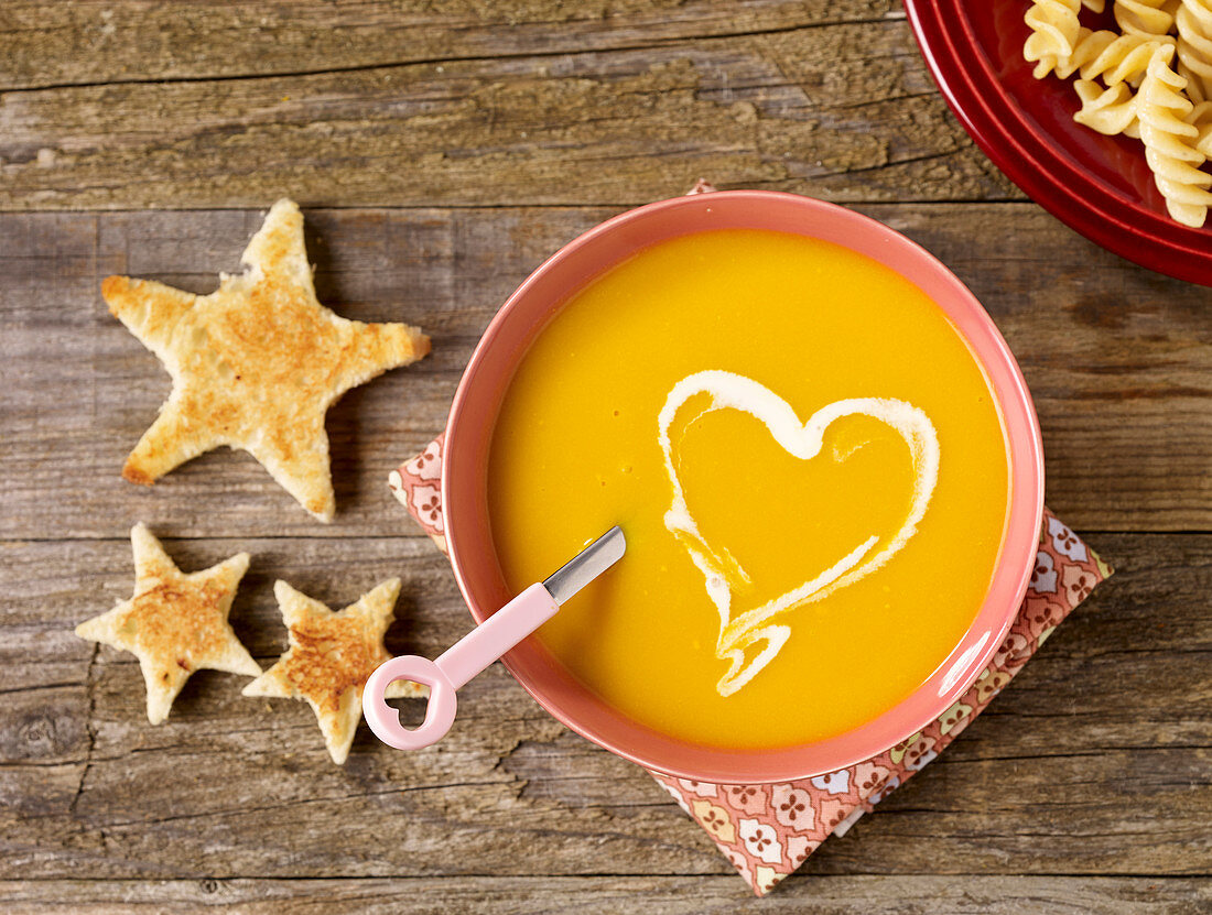 Chestnut and pumpkin soup with a cream heart and toast stars