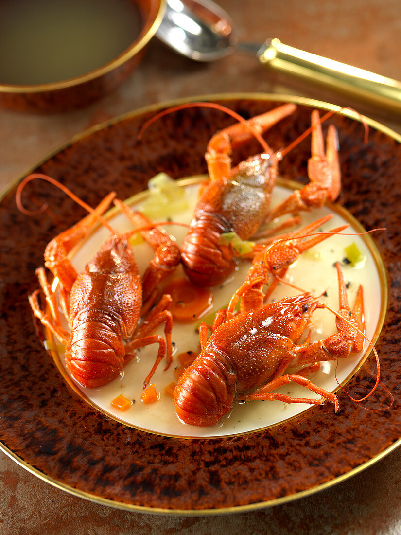 Crayfish on a sauce bed